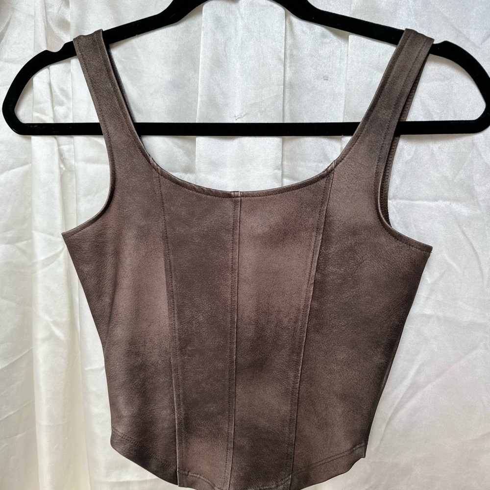 Sleeveless corset style tank top semi structured